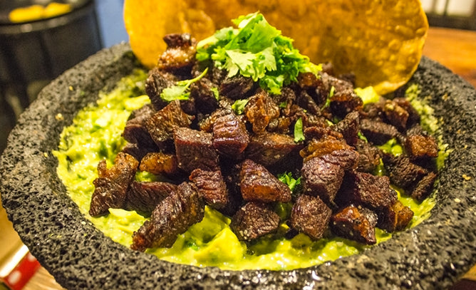 Rib eye cracklings in guacamole